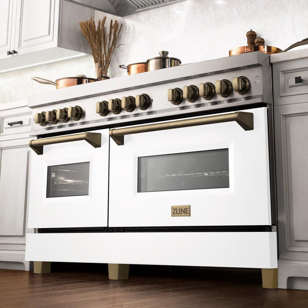 Autograph Edition 60 In. 7.4 Cu. Ft. Legacy Dual Fuel Range With 9 Burner Gas Cooktop And 2 Electric Convection Ovens In Stainless Steel With White Matte Doors And Champagne Bronze Accents RAZWM60CB