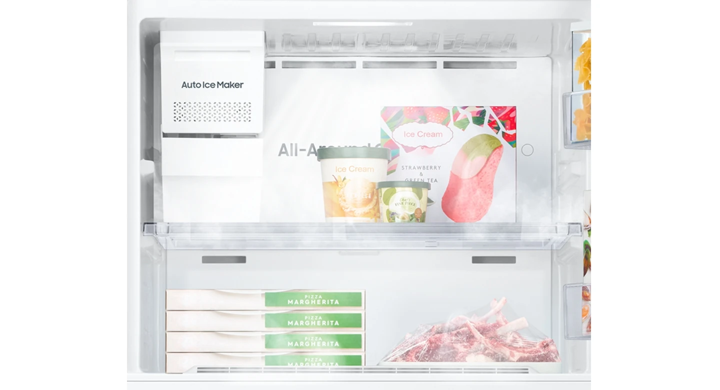 Top freezer refrigerator interior showcasing bright LED lighting
