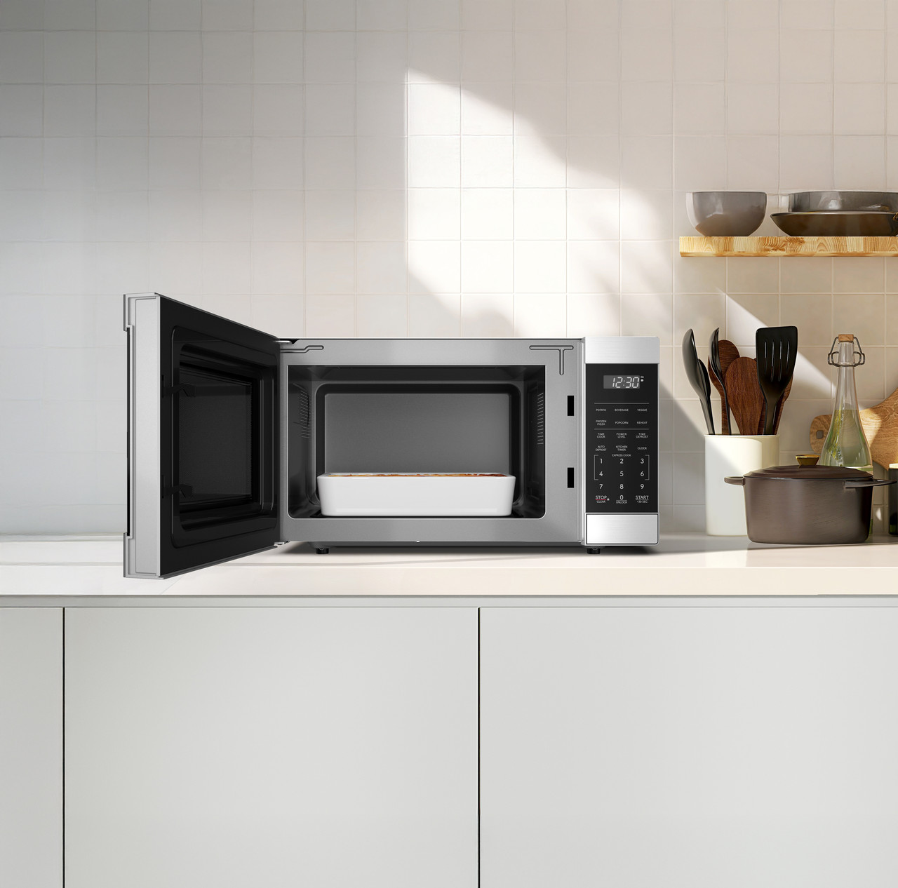 1.1 Cu. Ft. 1100w Flatbed Countertop Microwave Oven With Inverter Technology view 16