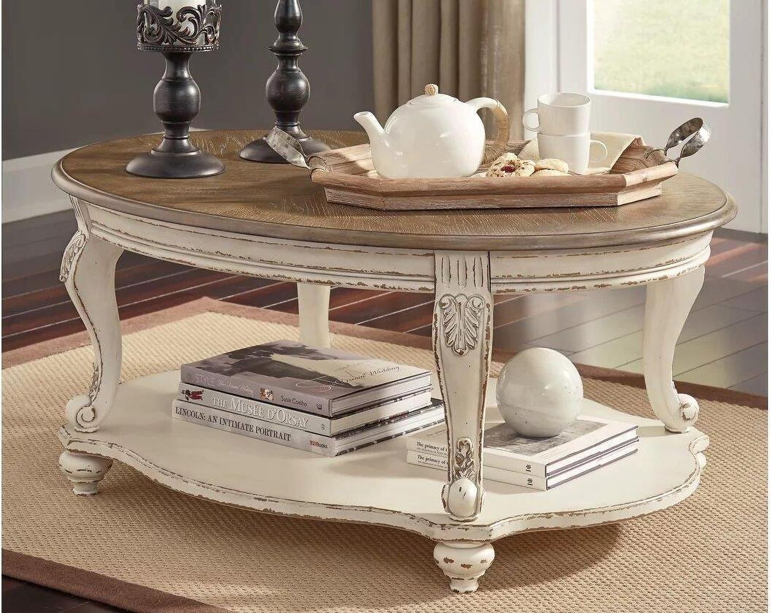 Realyn White and Brown Oval Cocktail Table T7430