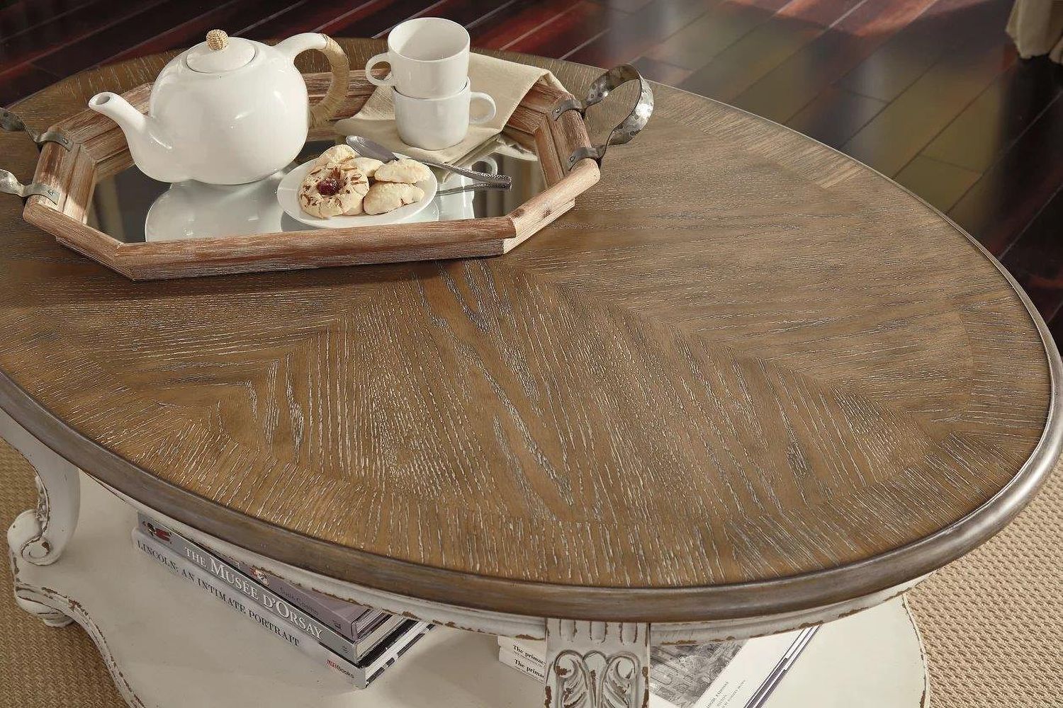 Realyn White and Brown Oval Cocktail Table T7430