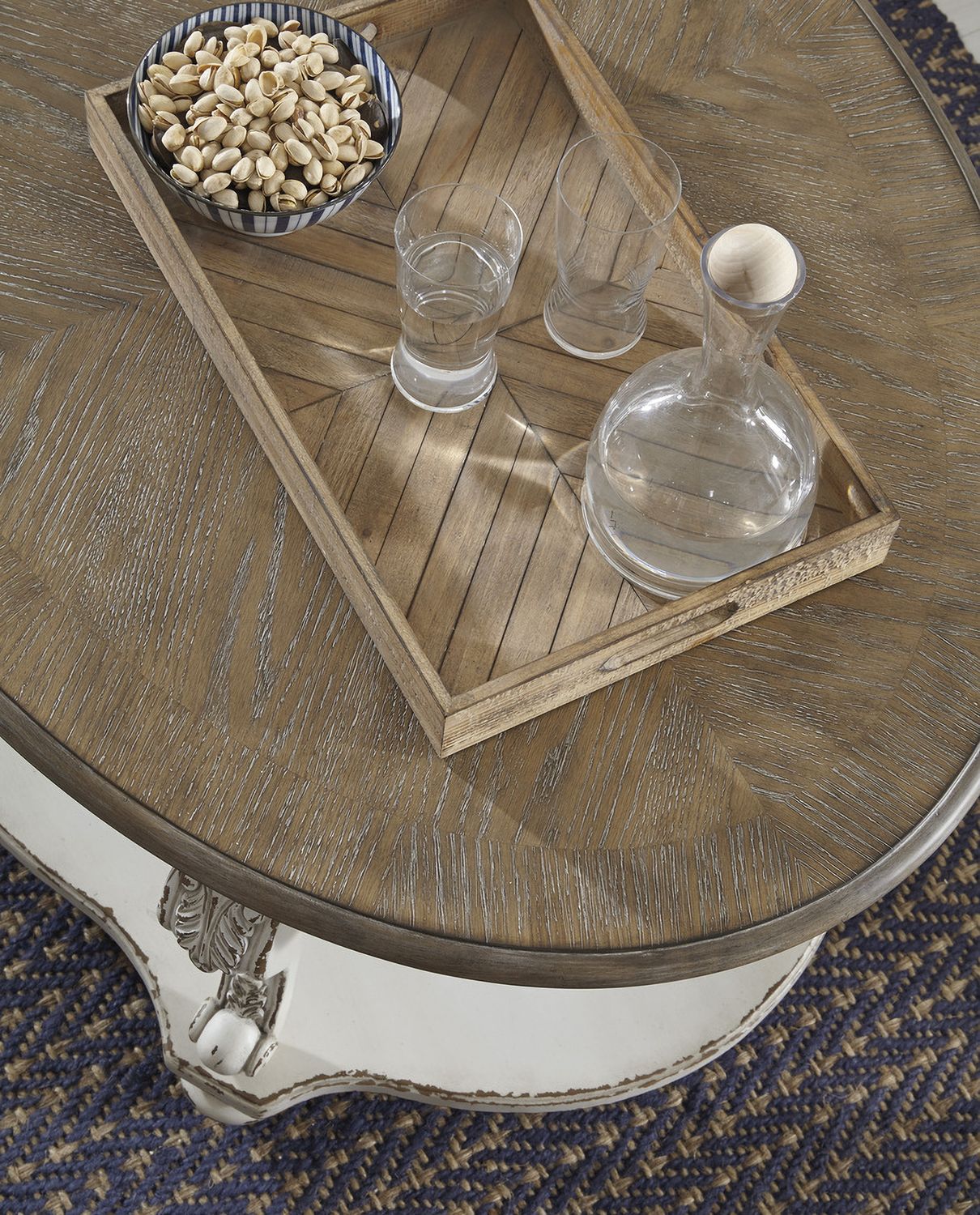 Realyn White and Brown Oval Cocktail Table T7430