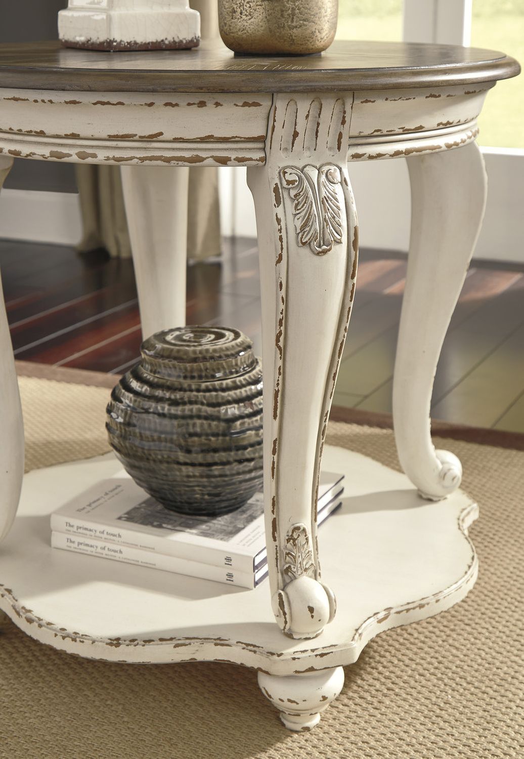 Realyn White and Brown Round End Table T7436