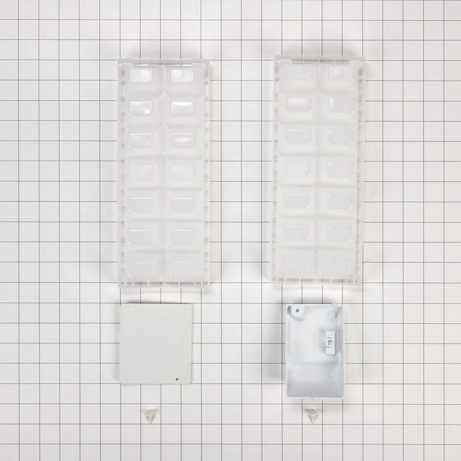 Ice Maker Kit, with (1) plastic closure, (3) hole plugs, (1) evaporator cover, (1) tube fitting cover and (2) ice trays W11412645