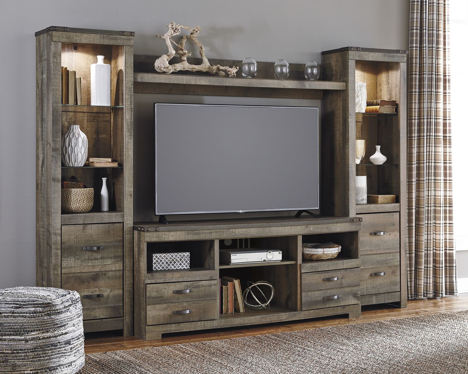 Trinell 4-Piece Entertainment Center with Electric Fireplace In Brown W446W10