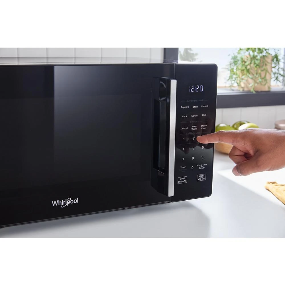 0.7 cu. ft. Black Countertop Microwave With Steam Clean - 700 watt view 27