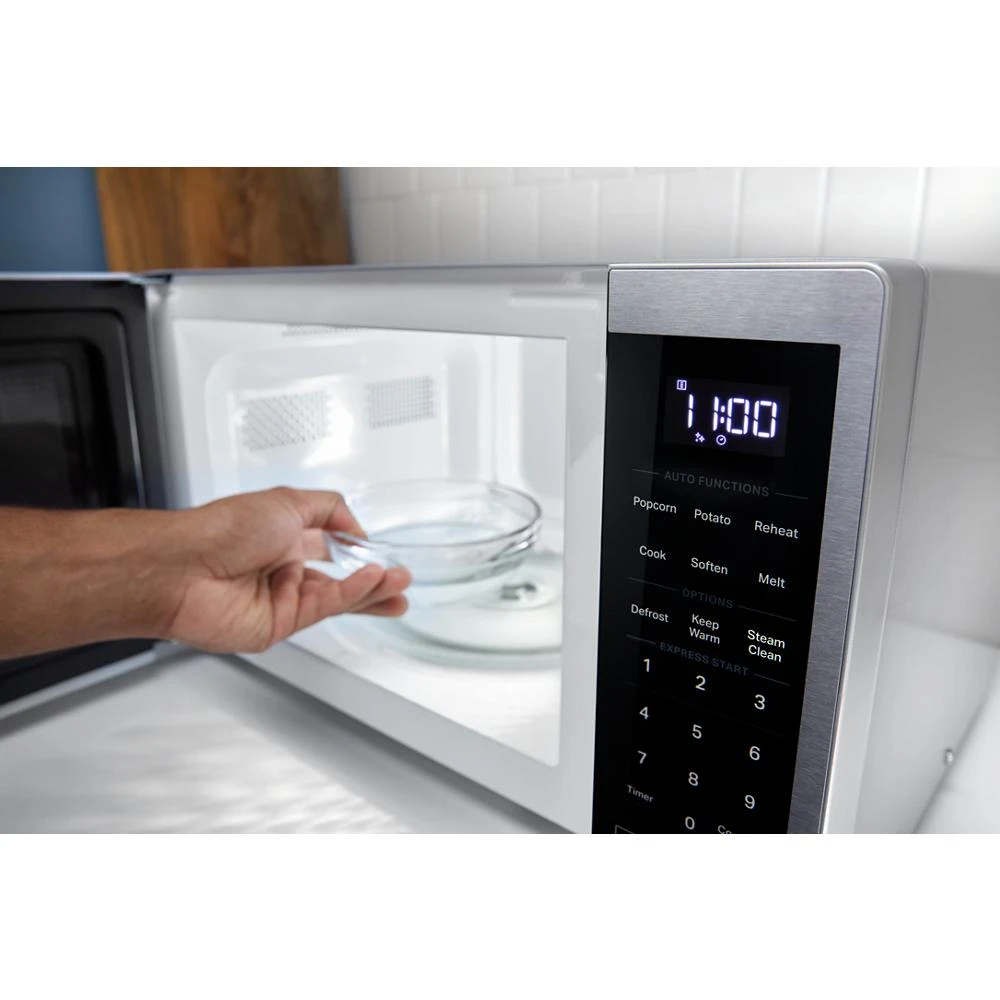 0.9 cu. ft. Black Countertop Microwave With Steam Clean - 900 watt view 22