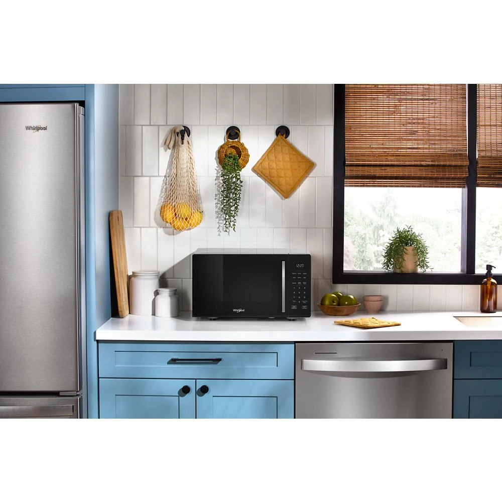 0.9 cu. ft. Black Countertop Microwave With Steam Clean - 900 watt view 24